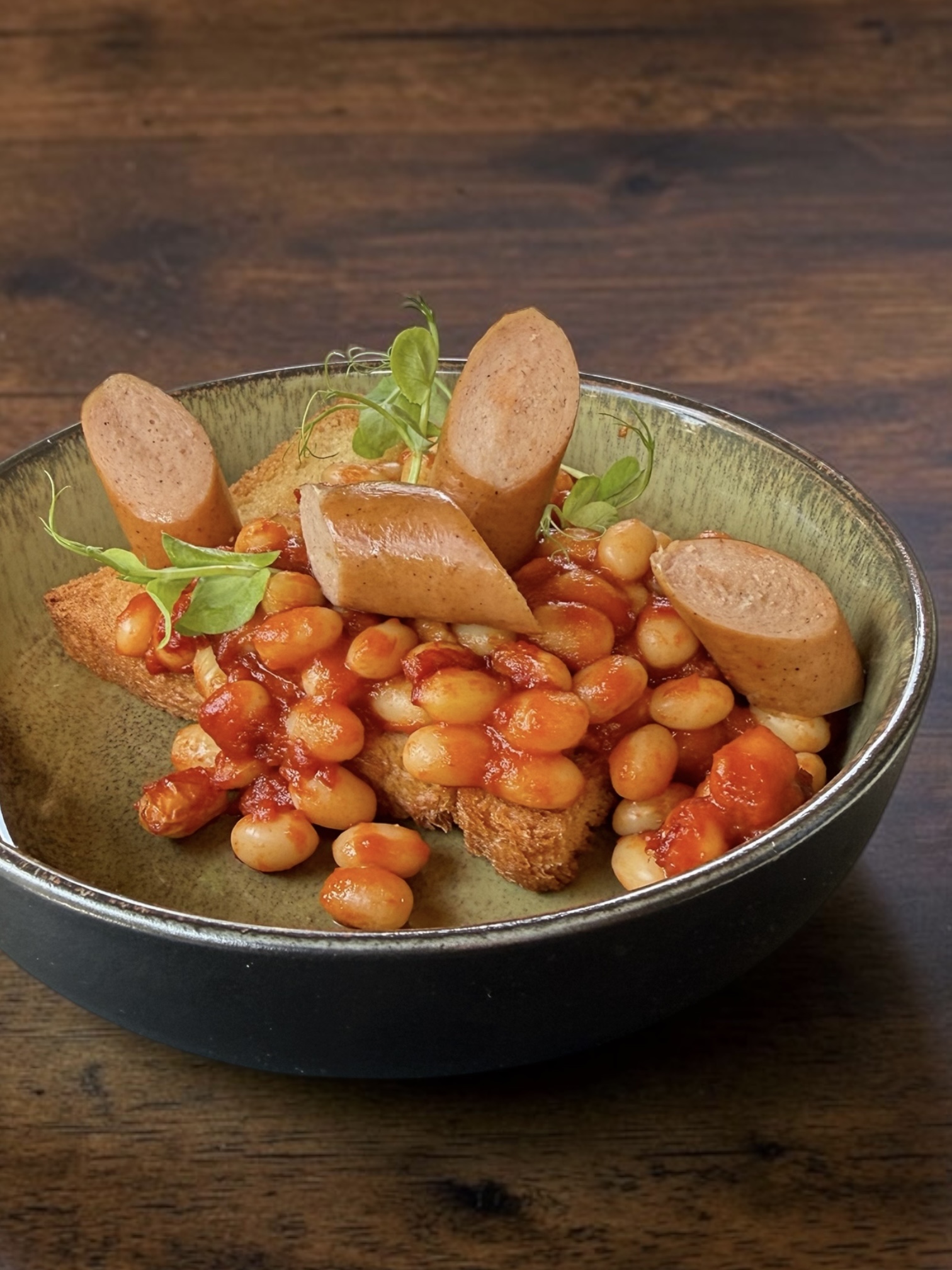 Baked beans on toast and sausage